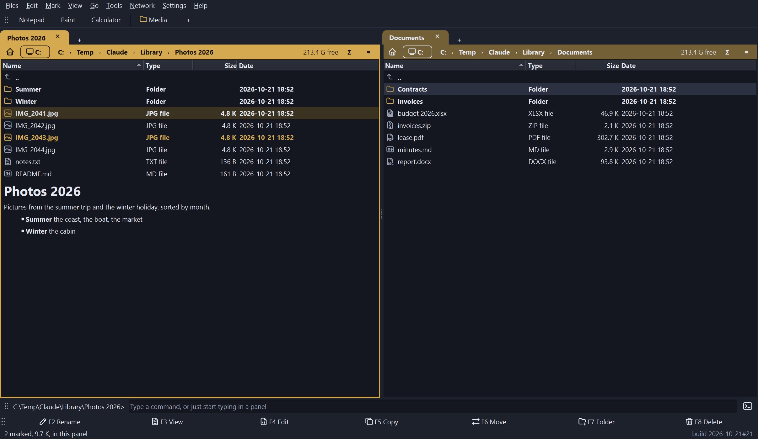 Dossier's main window in the dark scheme: two folder panels side by side, the left one showing a photo folder with two pictures marked and a folder note under the list, the programs bar above, the command line and the F2 to F8 key bar below.